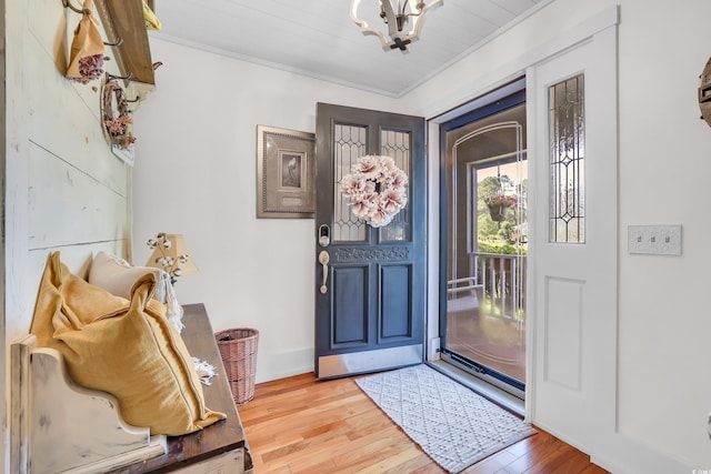 106 Furman Cir, Conway, SC 29526 - foyer featuring a chandelier, light wood-type flooring, and ornamental molding