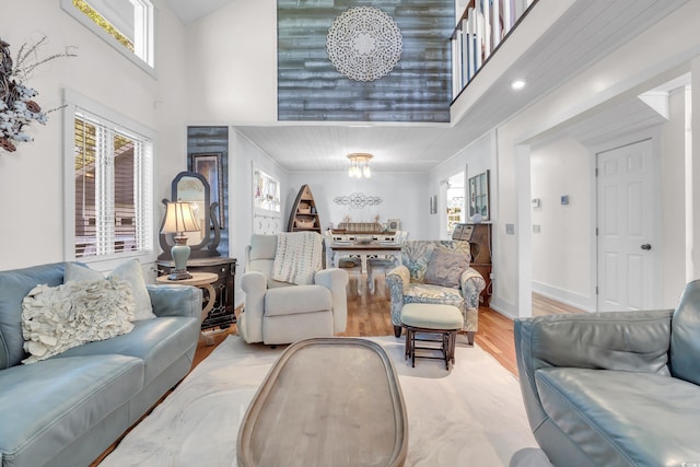 106 Furman Cir, Conway, SC 29526 - living area with a chandelier, wood finished floors, and a high ceiling