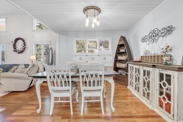 106 Furman Cir, Conway, SC 29526 - dining space with ornamental molding, light wood-style floors, and a chandelier