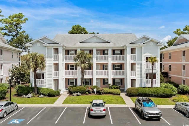 613 Waterway Village Blvd Unit 4-F, Myrtle Beach, SC 29579 - view of property with uncovered parking