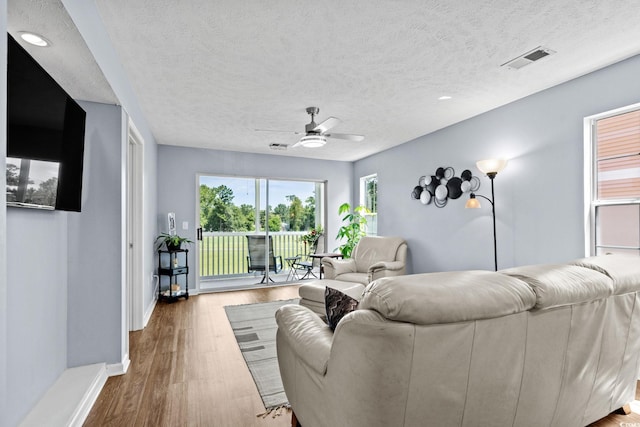 613 Waterway Village Blvd Unit 4-F, Myrtle Beach, SC 29579 - living area featuring a ceiling fan, a textured ceiling, wood finished floors, and recessed lighting