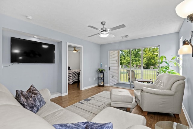 613 Waterway Village Blvd Unit 4-F, Myrtle Beach, SC 29579 - living area with a ceiling fan and wood finished floors