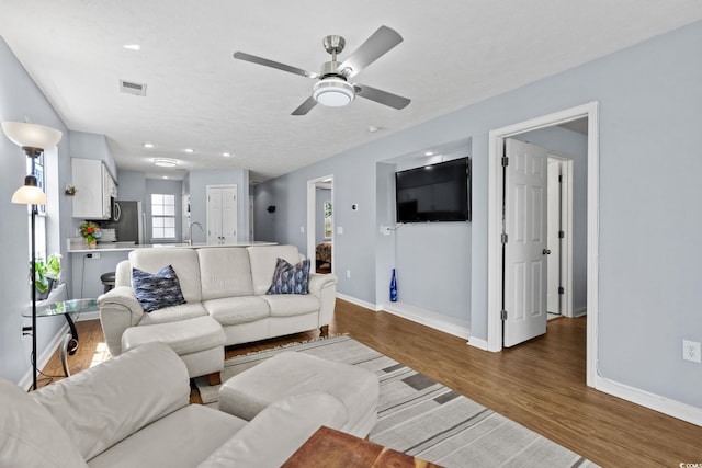 613 Waterway Village Blvd Unit 4-F, Myrtle Beach, SC 29579 - living area featuring wood finished floors, ceiling fan, and recessed lighting