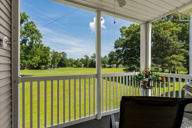 613 Waterway Village Blvd Unit 4-F, Myrtle Beach, SC 29579 - sunroom / solarium featuring a ceiling fan, view of golf course, and view of wooded area