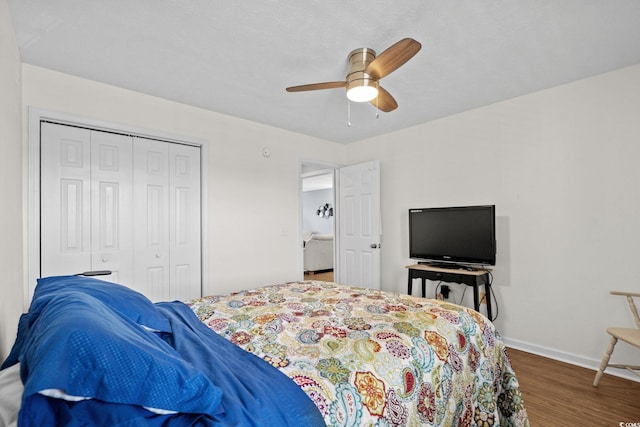 613 Waterway Village Blvd Unit 4-F, Myrtle Beach, SC 29579 - bedroom featuring a closet, wood finished floors, and ceiling fan