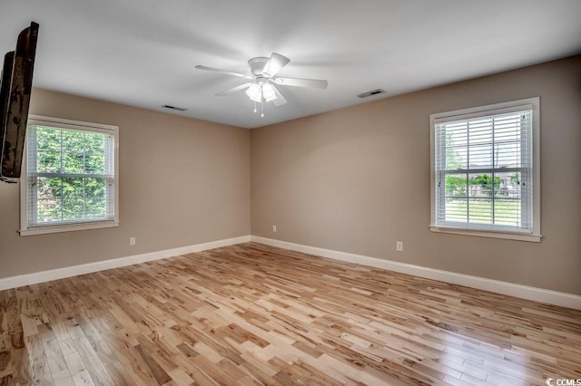 414 Dunes Dr, Myrtle Beach, SC 29572 - empty room featuring light wood-style flooring and a ceiling fan