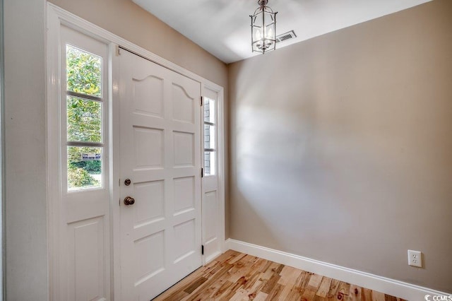 414 Dunes Dr, Myrtle Beach, SC 29572 - foyer featuring baseboards and light wood-type flooring