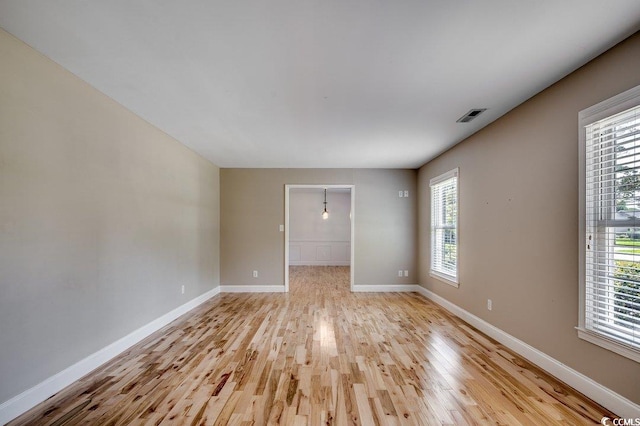 414 Dunes Dr, Myrtle Beach, SC 29572 - spare room with light wood-type flooring and plenty of natural light