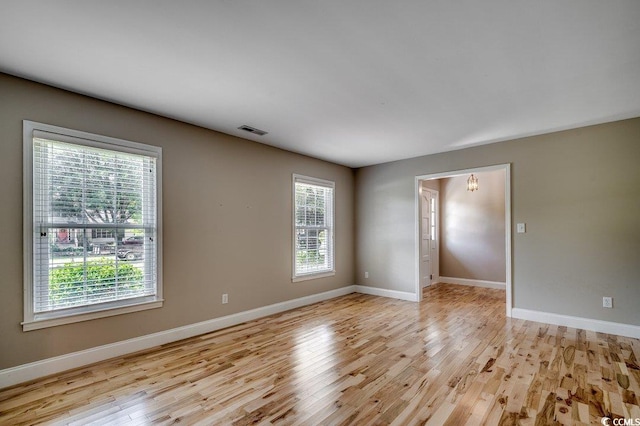 414 Dunes Dr, Myrtle Beach, SC 29572 - unfurnished room with light wood-style floors and baseboards