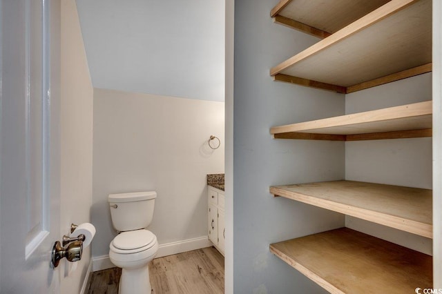 414 Dunes Dr, Myrtle Beach, SC 29572 - bathroom with wood finished floors and vanity