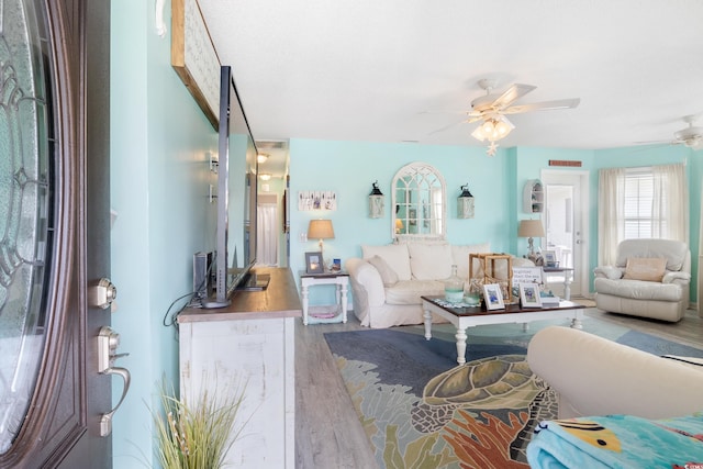 919 Dock Pl, Murrells Inlet, SC 29576 - living room featuring a ceiling fan and wood finished floors