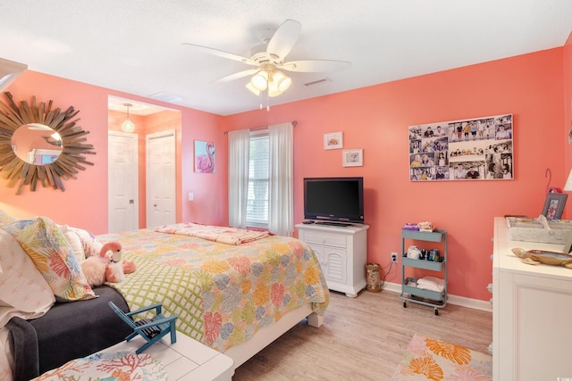 919 Dock Pl, Murrells Inlet, SC 29576 - bedroom featuring light wood-style floors and a ceiling fan