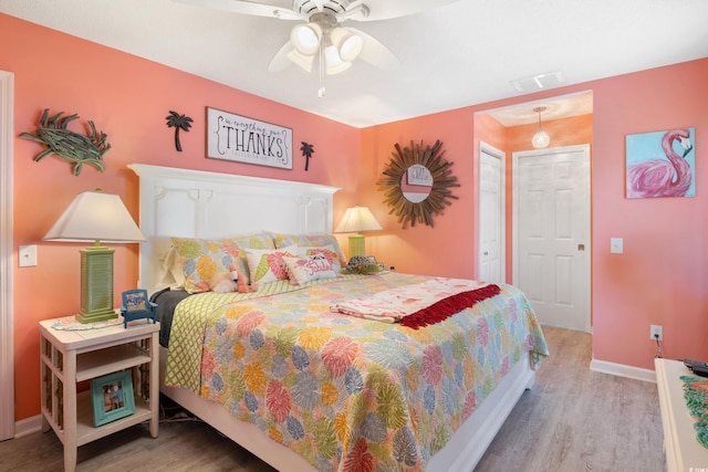 919 Dock Pl, Murrells Inlet, SC 29576 - bedroom with wood finished floors and a ceiling fan