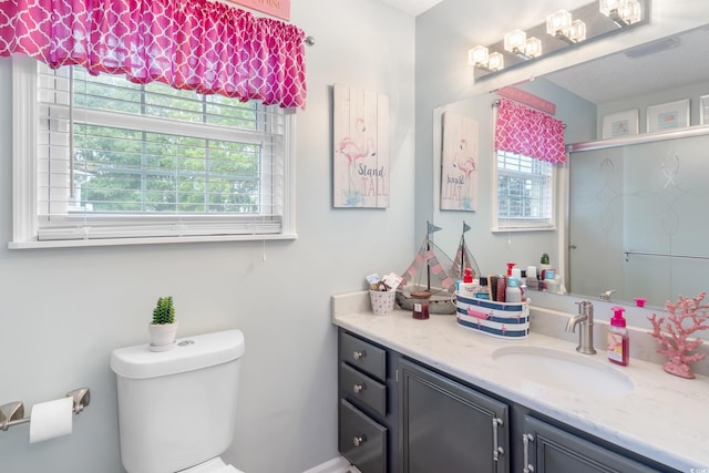 919 Dock Pl, Murrells Inlet, SC 29576 - bathroom featuring vanity, plenty of natural light, and a shower with shower door