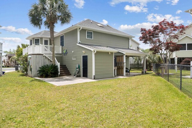 919 Dock Pl, Murrells Inlet, SC 29576 - rear view of property featuring a patio, a shingled roof, and stairway