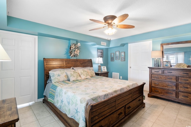 919 Dock Pl, Murrells Inlet, SC 29576 - bedroom with light tile patterned flooring and a ceiling fan