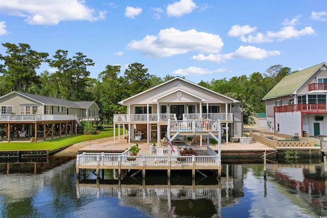 460 River Front St S, Conway, SC 29527 - rear view of house featuring stairway, a deck with water view, and a patio area