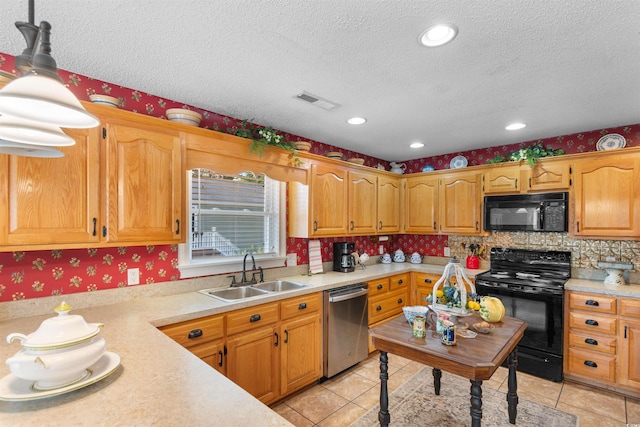 460 River Front St S, Conway, SC 29527 - kitchen with black appliances, a textured ceiling, light countertops, light tile patterned flooring, and decorative backsplash