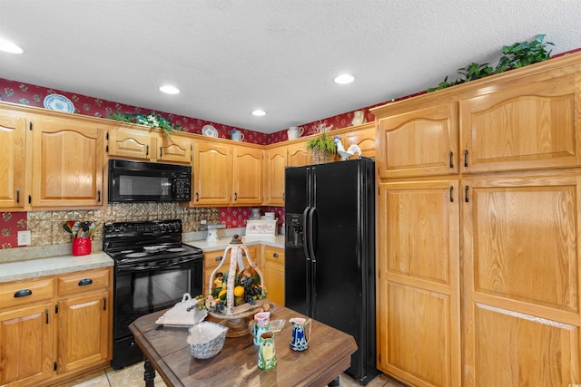 460 River Front St S, Conway, SC 29527 - kitchen with black appliances, light countertops, tasteful backsplash, recessed lighting, and a textured ceiling