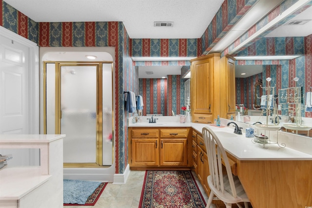 460 River Front St S, Conway, SC 29527 - full bath featuring wallpapered walls, a shower stall, double vanity, and tile patterned flooring