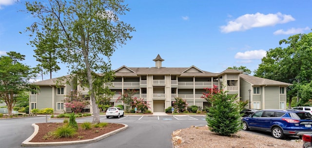 1551 Spinnaker Dr Unit 5935, North Myrtle Beach, SC 29582 - view of property featuring uncovered parking