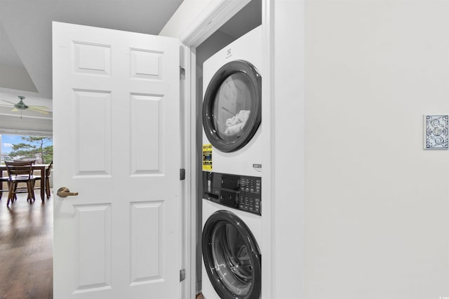 1551 Spinnaker Dr Unit 5935, North Myrtle Beach, SC 29582 - laundry area featuring stacked washer and clothes dryer, wood finished floors, and a ceiling fan