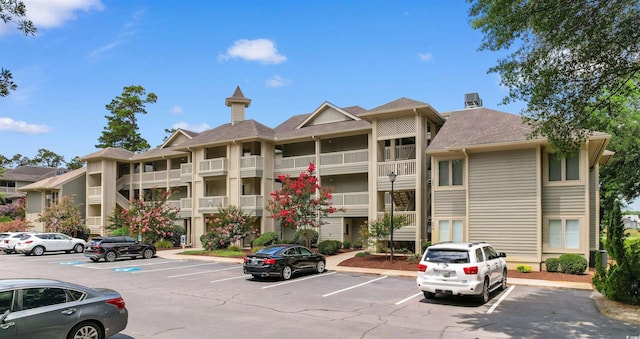 1551 Spinnaker Dr Unit 5935, North Myrtle Beach, SC 29582 - view of property featuring uncovered parking