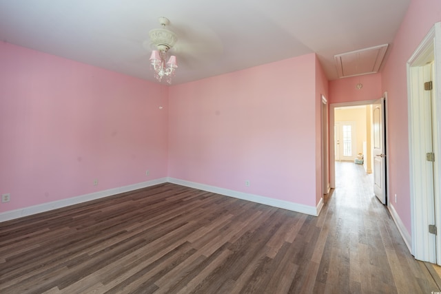 4302 Grande Harbour Blvd Unit 4302, Little River, SC 29566 - spare room featuring attic access, wood finished floors, and a chandelier