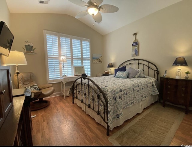 216 Coral Beach Cir, Myrtle Beach, SC 29575 - bedroom featuring lofted ceiling, wood finished floors, and a ceiling fan