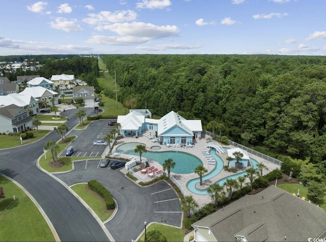 216 Coral Beach Cir, Myrtle Beach, SC 29575 - bird's eye view of a forest and a pool area