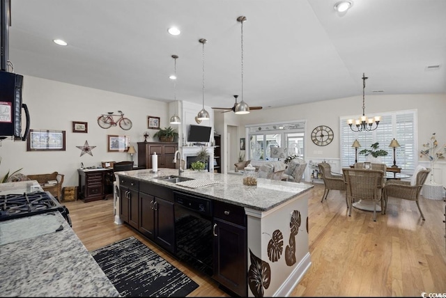 216 Coral Beach Cir, Myrtle Beach, SC 29575 - kitchen featuring open floor plan, black appliances, a chandelier, light wood-style floors, and ceiling fan