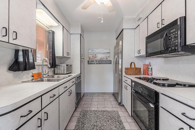 964 Oakwood Ln, Myrtle Beach, SC 29572 - kitchen with black appliances, light countertops, a ceiling fan, and light tile patterned floors