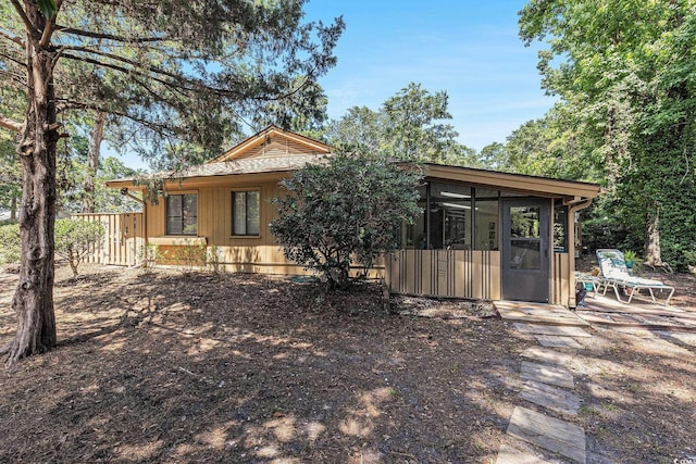 964 Oakwood Ln, Myrtle Beach, SC 29572 - back of house with a sunroom