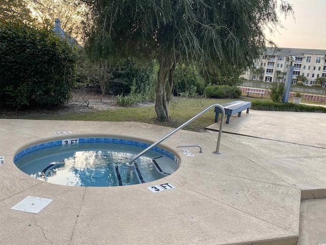 964 Oakwood Ln, Myrtle Beach, SC 29572 - view of swimming pool featuring a hot tub