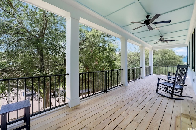 1320 James Island Ave, North Myrtle Beach, SC 29582 - wooden terrace featuring ceiling fan and view of scattered trees