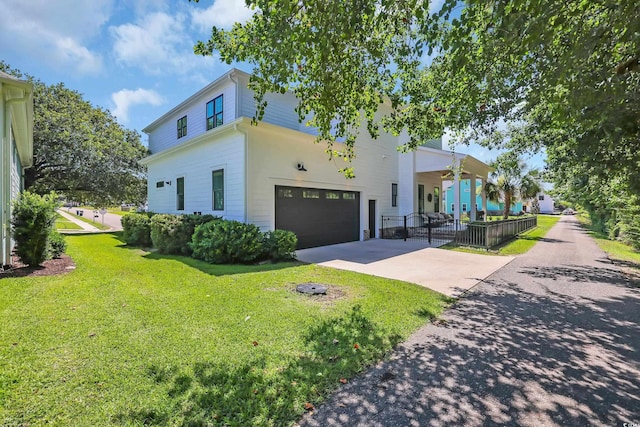 1320 James Island Ave, North Myrtle Beach, SC 29582 - view of front of home featuring a garage, a front lawn, and driveway