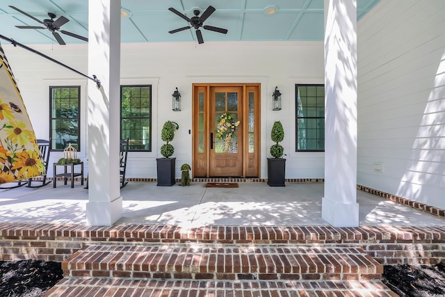 1320 James Island Ave, North Myrtle Beach, SC 29582 - view of exterior entry with a porch and a ceiling fan