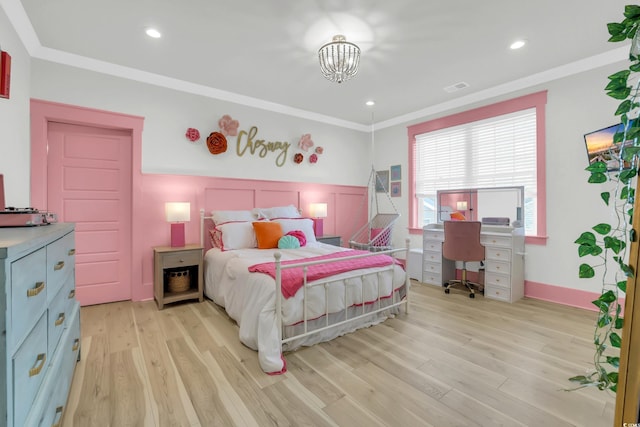 1320 James Island Ave, North Myrtle Beach, SC 29582 - bedroom with crown molding, light wood finished floors, a chandelier, wainscoting, and a desk
