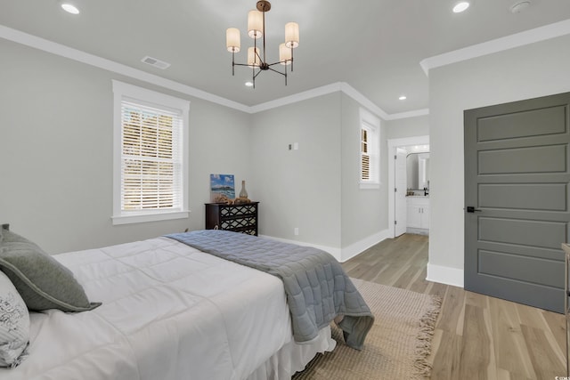 1320 James Island Ave, North Myrtle Beach, SC 29582 - bedroom featuring light wood-type flooring, a chandelier, ornamental molding, and recessed lighting