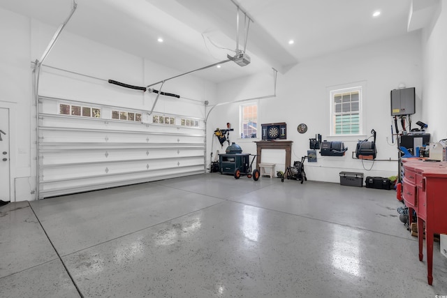 1320 James Island Ave, North Myrtle Beach, SC 29582 - garage featuring a garage door opener and recessed lighting