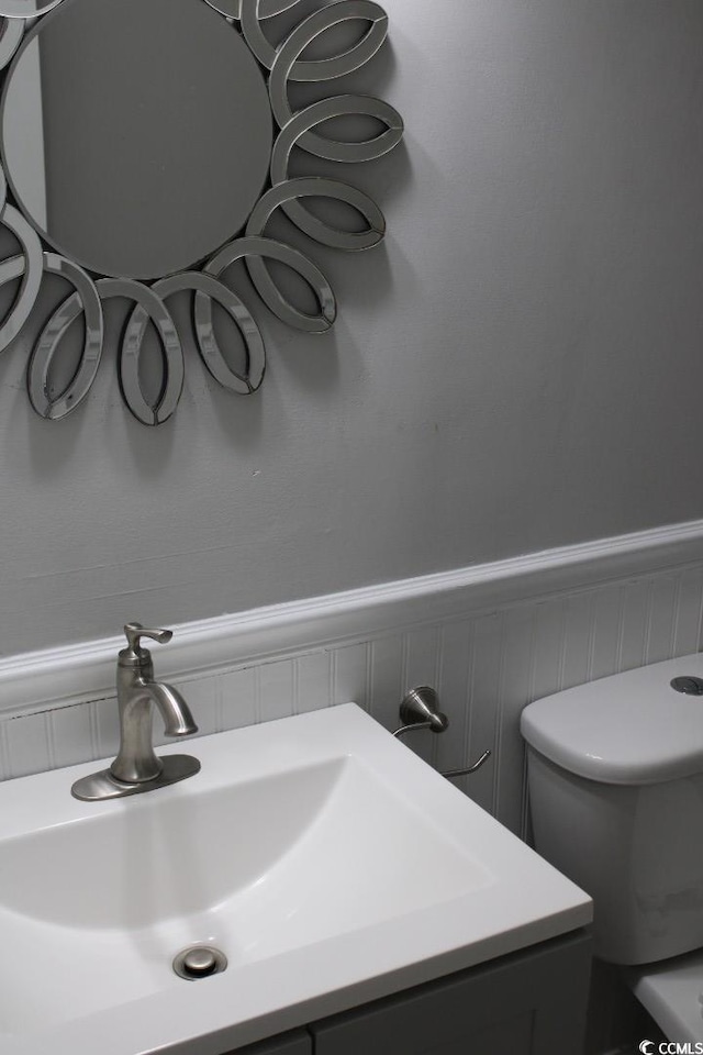1919 Spring St Unit A-24, North Myrtle Beach, SC 29582 - bathroom featuring vanity and wainscoting