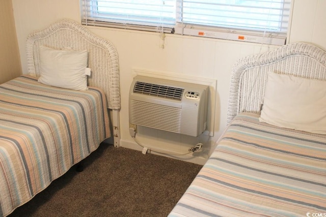 1919 Spring St Unit A-24, North Myrtle Beach, SC 29582 - carpeted bedroom featuring a wall mounted air conditioner