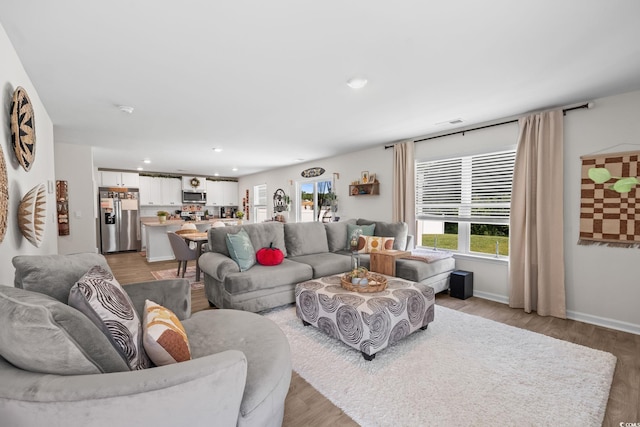 358 Spruce Pine Way, Conway, SC 29526 - living room featuring healthy amount of natural light, light wood-style flooring, and recessed lighting