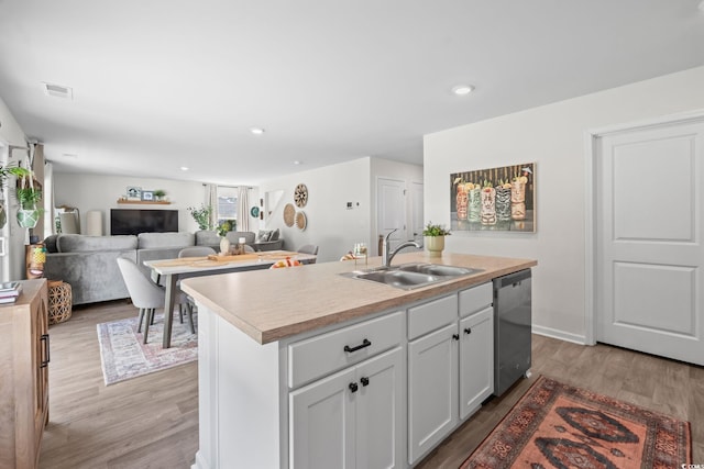 358 Spruce Pine Way, Conway, SC 29526 - kitchen featuring dishwasher, light wood-style flooring, a center island with sink, light countertops, and recessed lighting