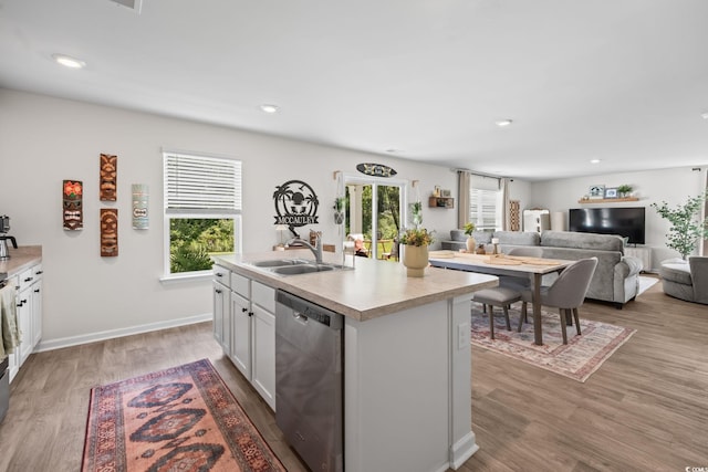 358 Spruce Pine Way, Conway, SC 29526 - kitchen featuring stainless steel dishwasher, plenty of natural light, light countertops, light wood finished floors, and recessed lighting