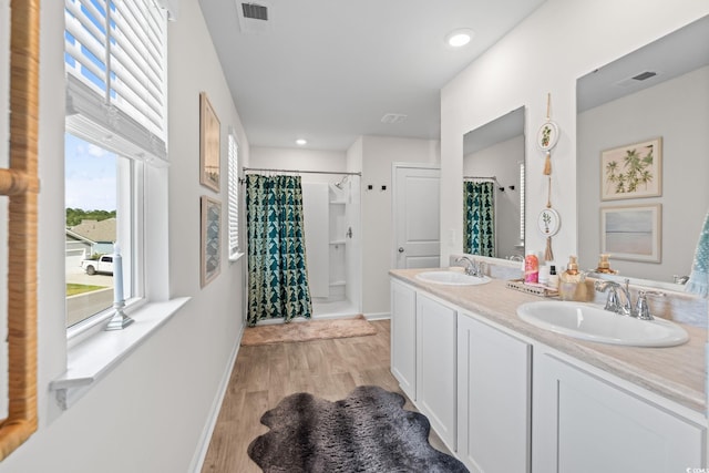 358 Spruce Pine Way, Conway, SC 29526 - full bathroom with a shower with shower curtain, wood finished floors, double vanity, and recessed lighting