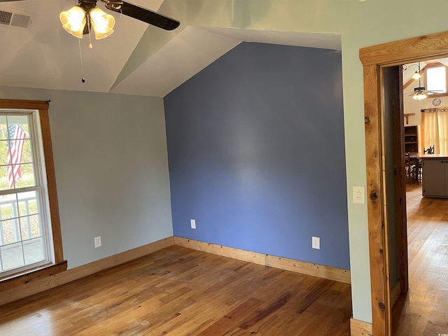 673 Brick Chimney Rd, Georgetown, SC 29440 - spare room featuring a ceiling fan, hardwood / wood-style floors, and lofted ceiling