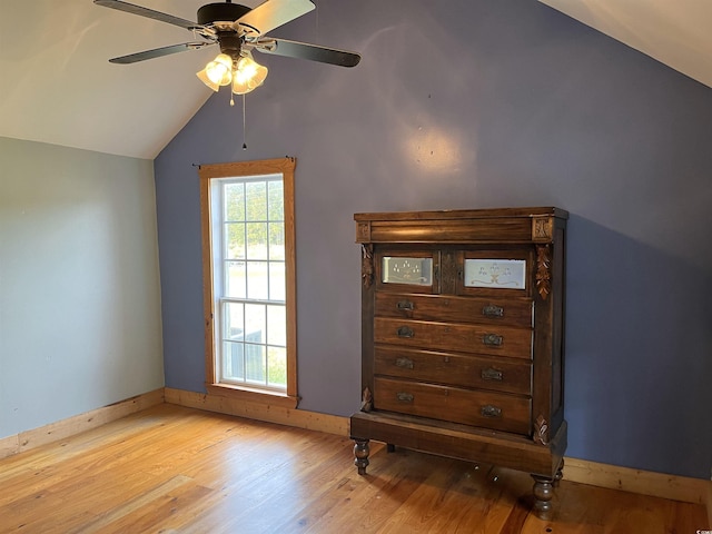 673 Brick Chimney Rd, Georgetown, SC 29440 - bedroom featuring light wood finished floors, vaulted ceiling, and a ceiling fan