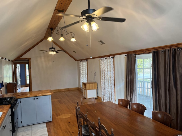 673 Brick Chimney Rd, Georgetown, SC 29440 - dining area featuring a ceiling fan, vaulted ceiling, and light wood-style floors