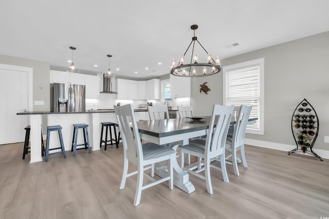 330 51st Ave N, North Myrtle Beach, SC 29582 - dining room with a chandelier, light wood-type flooring, and recessed lighting